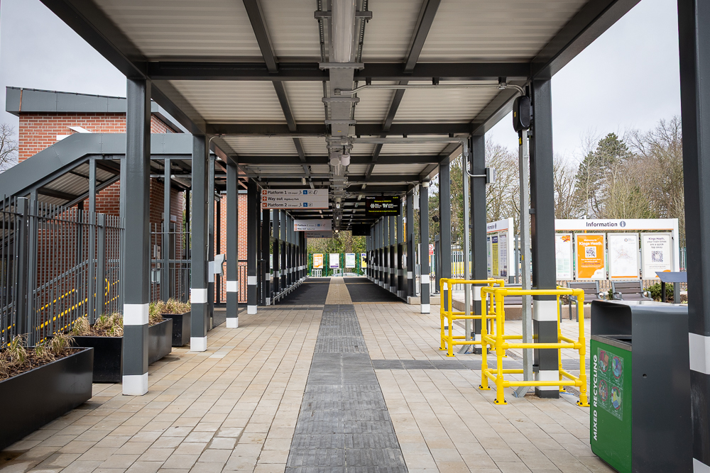 An image of the walkway at Kings Heath railway station.