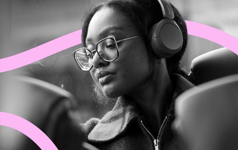 woman listening to music on bus